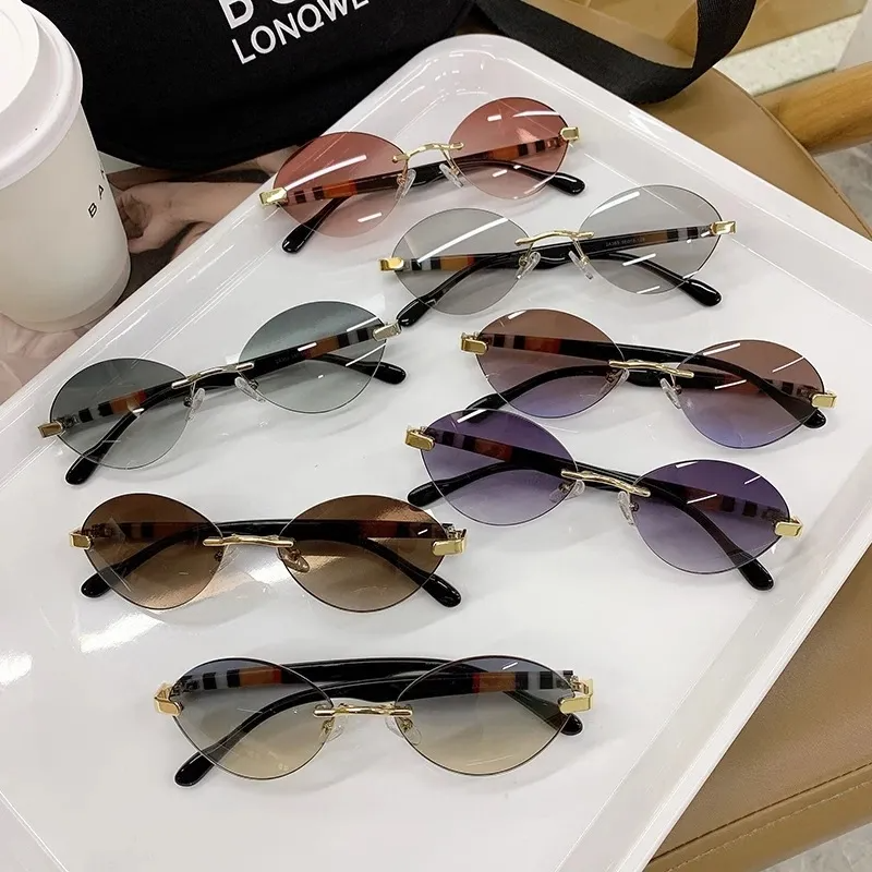 Vintage Oval Frame Rimless Sunglasses